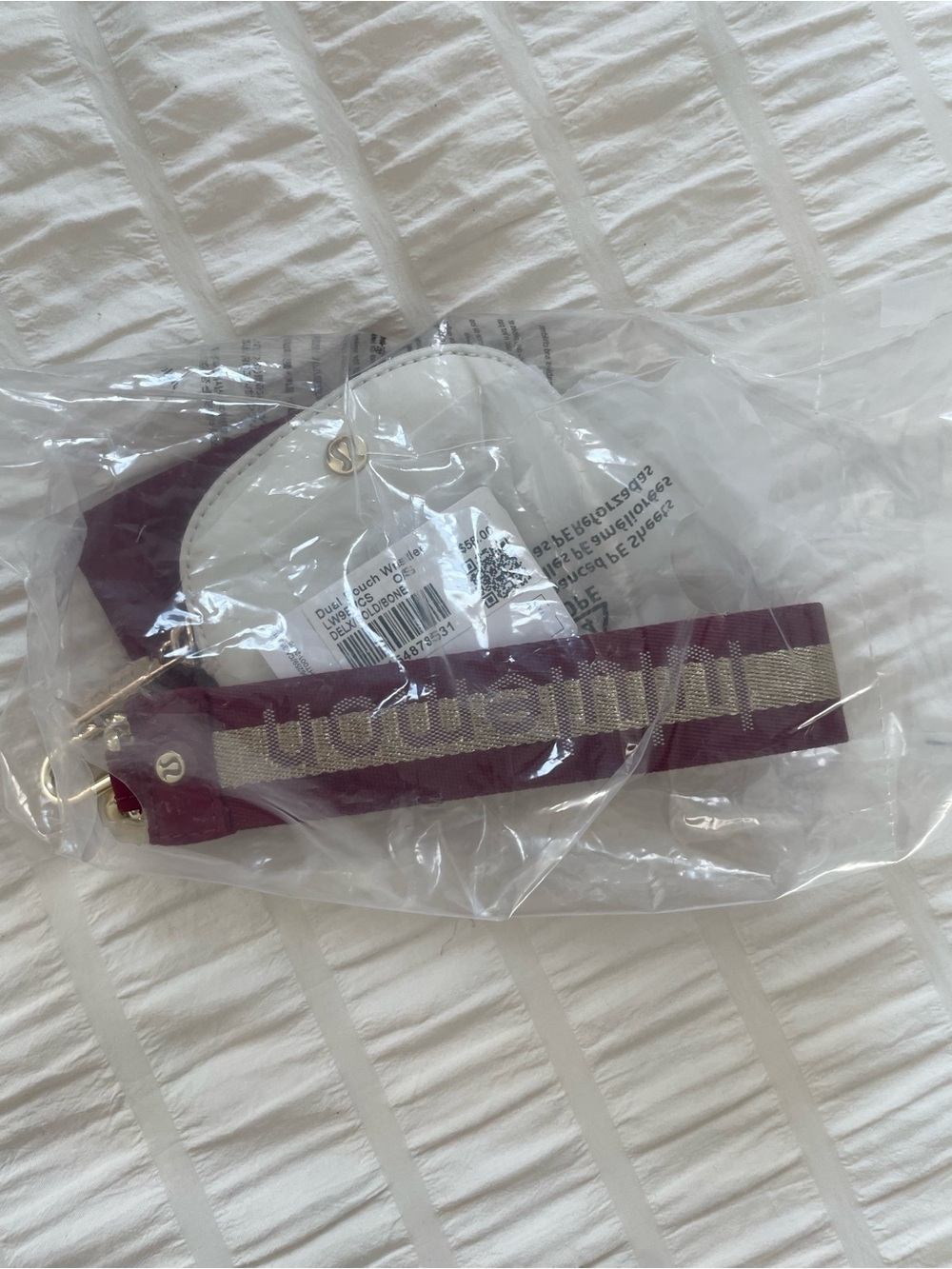NWT LULULEMON DUAL
POUCH WRISTLET Deep
Luxe/Gold/Bone OS